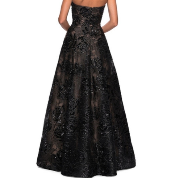Steal the spotlight in La Femme 27164 black floor length strapless A-line gown. - Picture 10 of 16